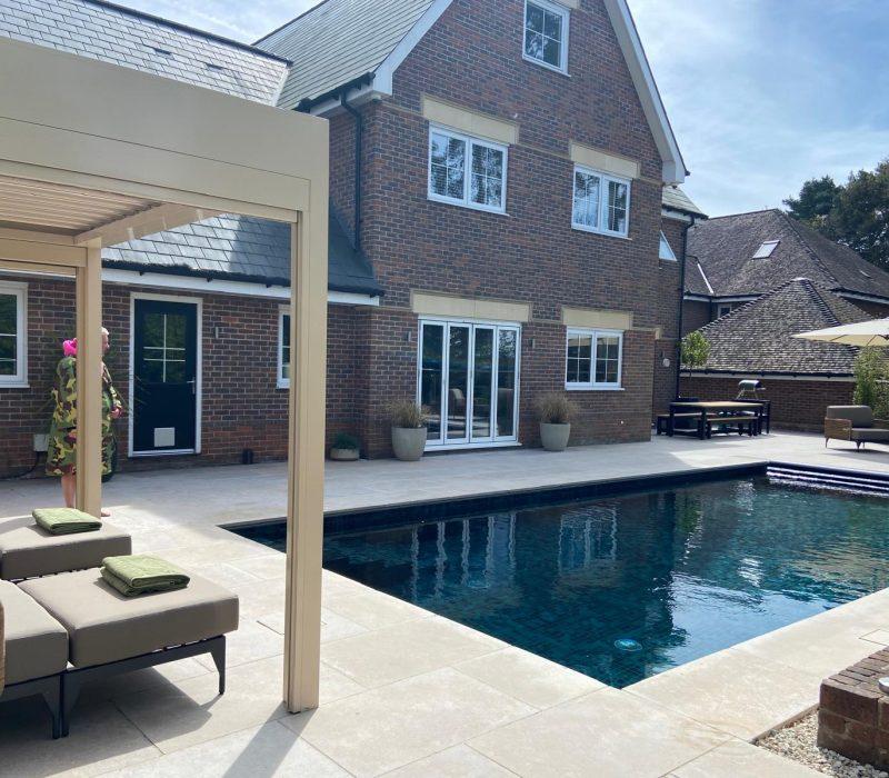 PoolCraft Ltd - Luxury outdoor pool installation in Camberley with pool cover and high quality mosaic