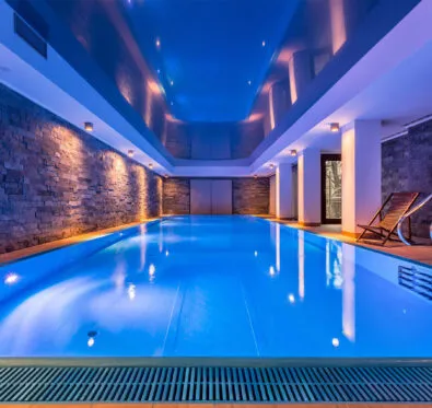 Poolcraft Ltd - Inground inside pool with chrome finishes and underwater lighting