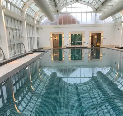 Poolcraft Ltd - view of an inground inside pool with a curved bottom