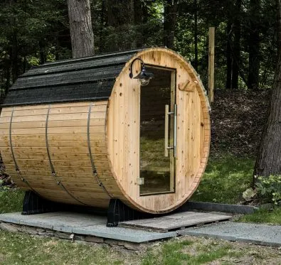 PoolCraft Ltd - Wooden barrel sauna outside