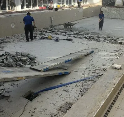 PoolCraft Ltd Indoor swimming pool renovation that required demolition & floor removal
